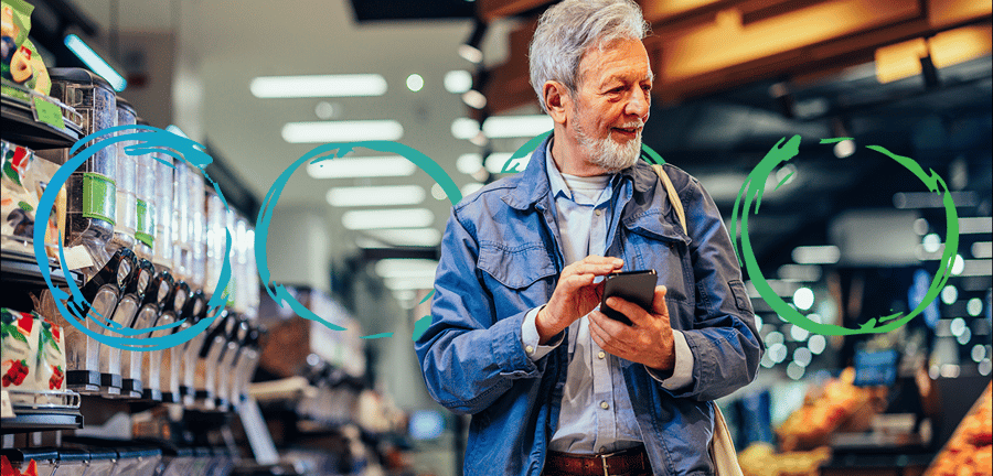 man shopping in store while on phone